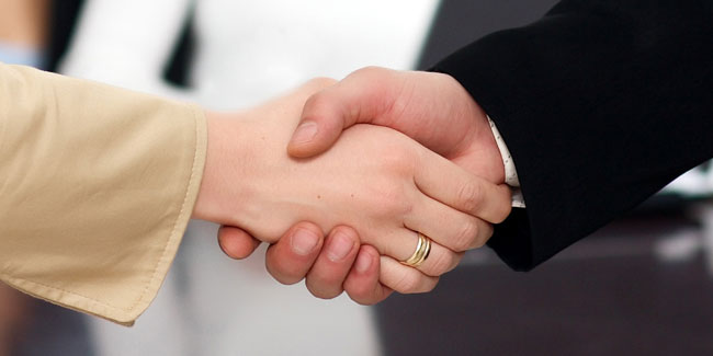 Handshake also belongs to job interview etiquette, illustation of a handshake of man and woman