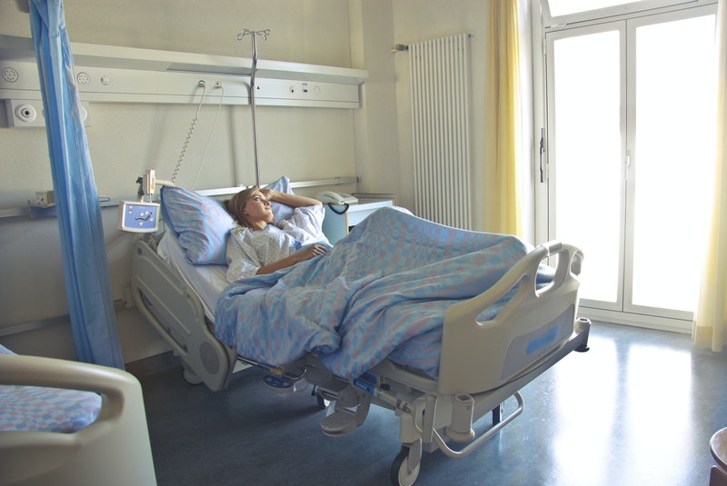 young patient in a hospital bed